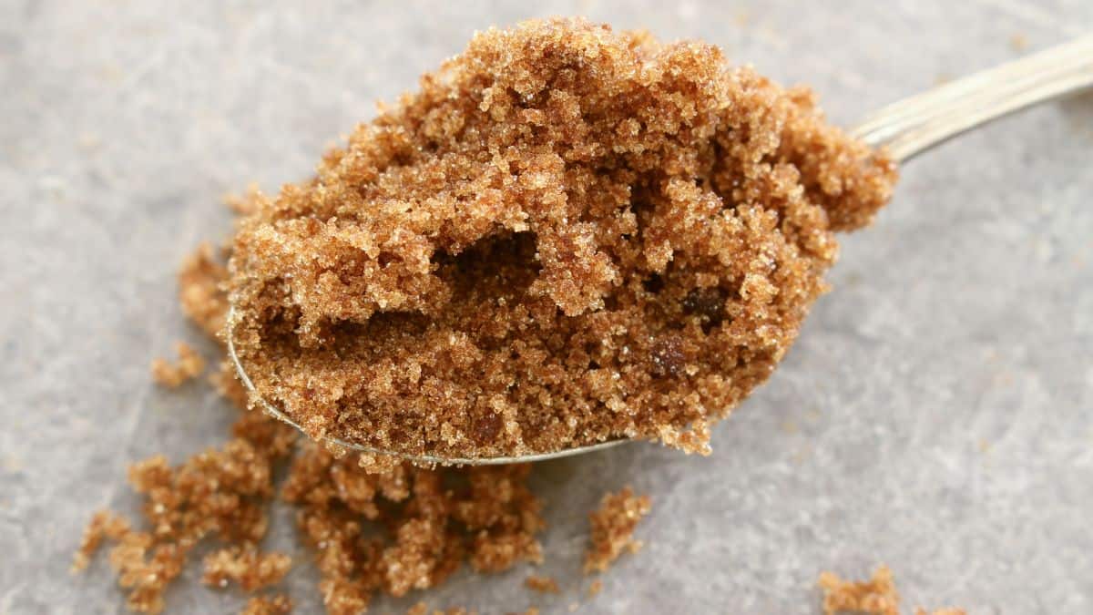 Brown sugar in a spoon.