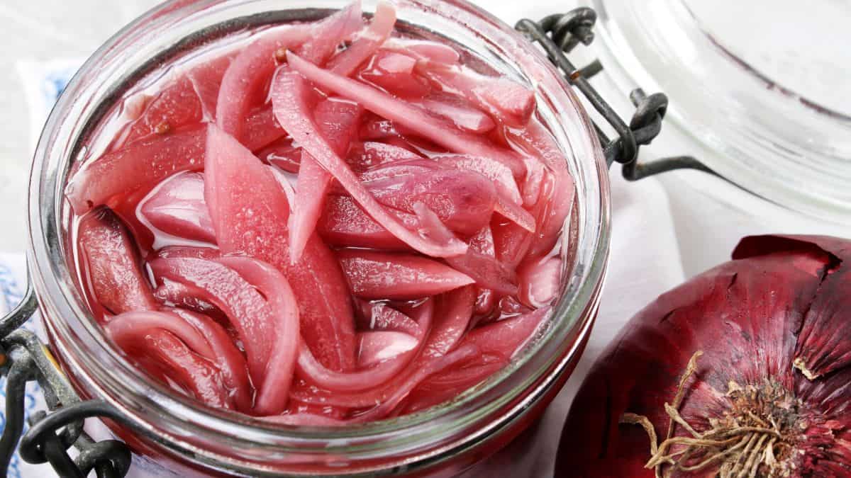 Close-up of a jar of pickled onions.