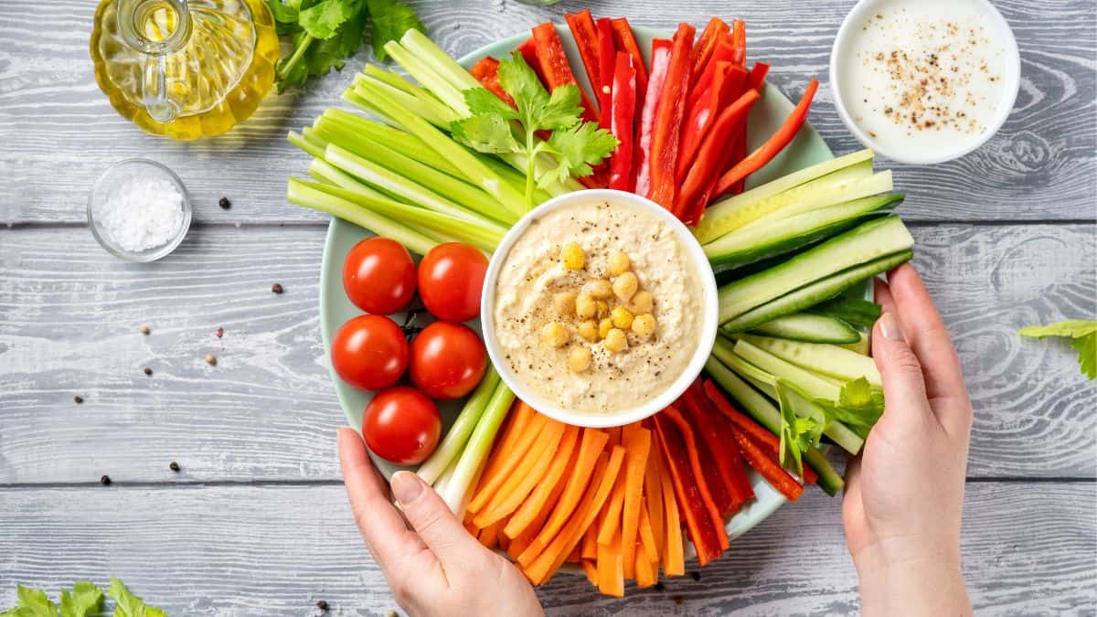 Dips placed in veggie platter.