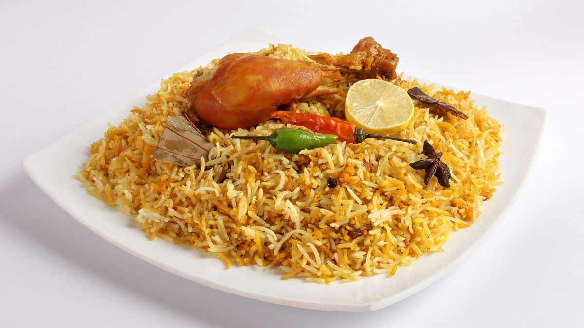 Sindhi chicken biryani on a white plate.