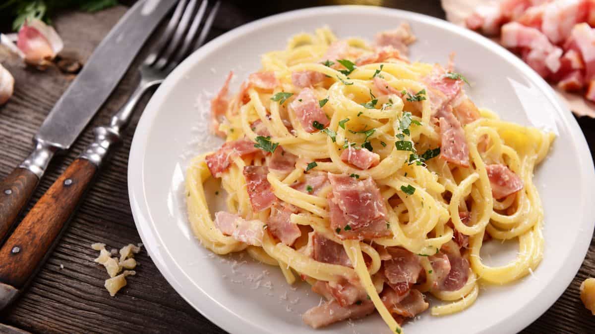 Carbonara pasta in a white plate.