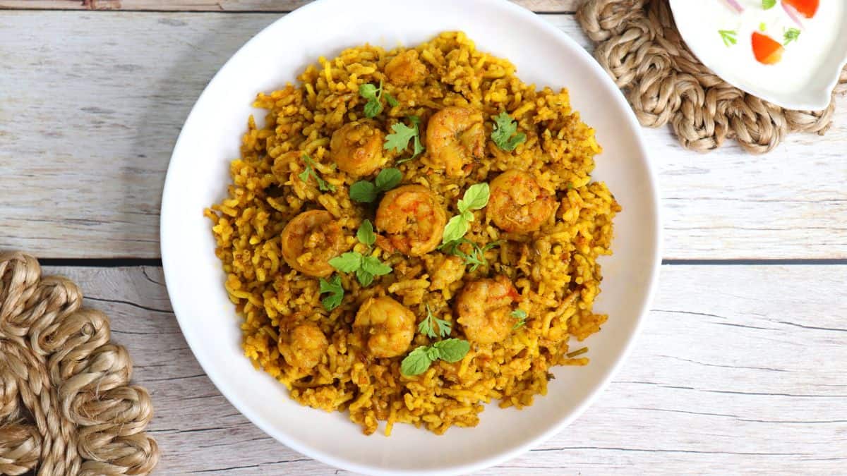 Thalassery biryani on a white plate.