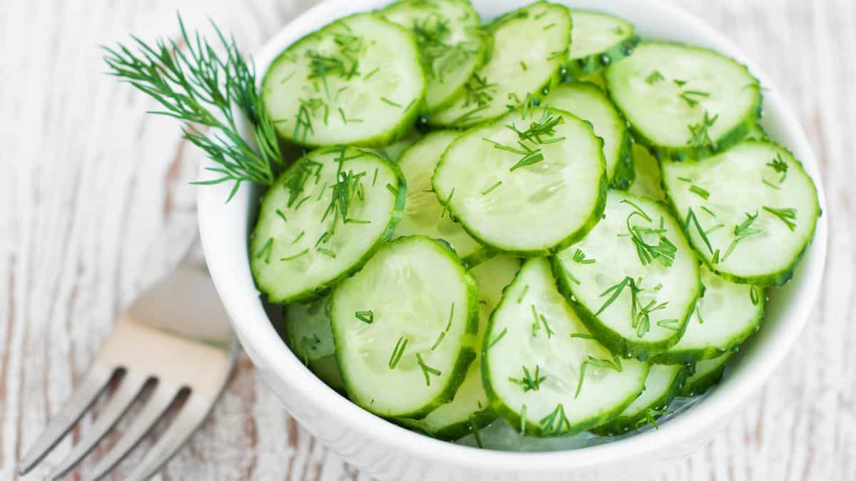 Dill garnished on cucumber salad.