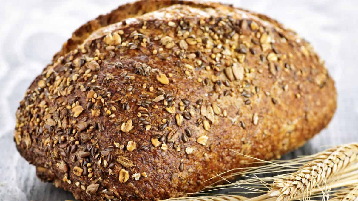 A loaf of multigrain sourdough bread.