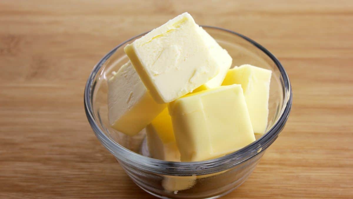 Cubes on butter in a glass bowl.