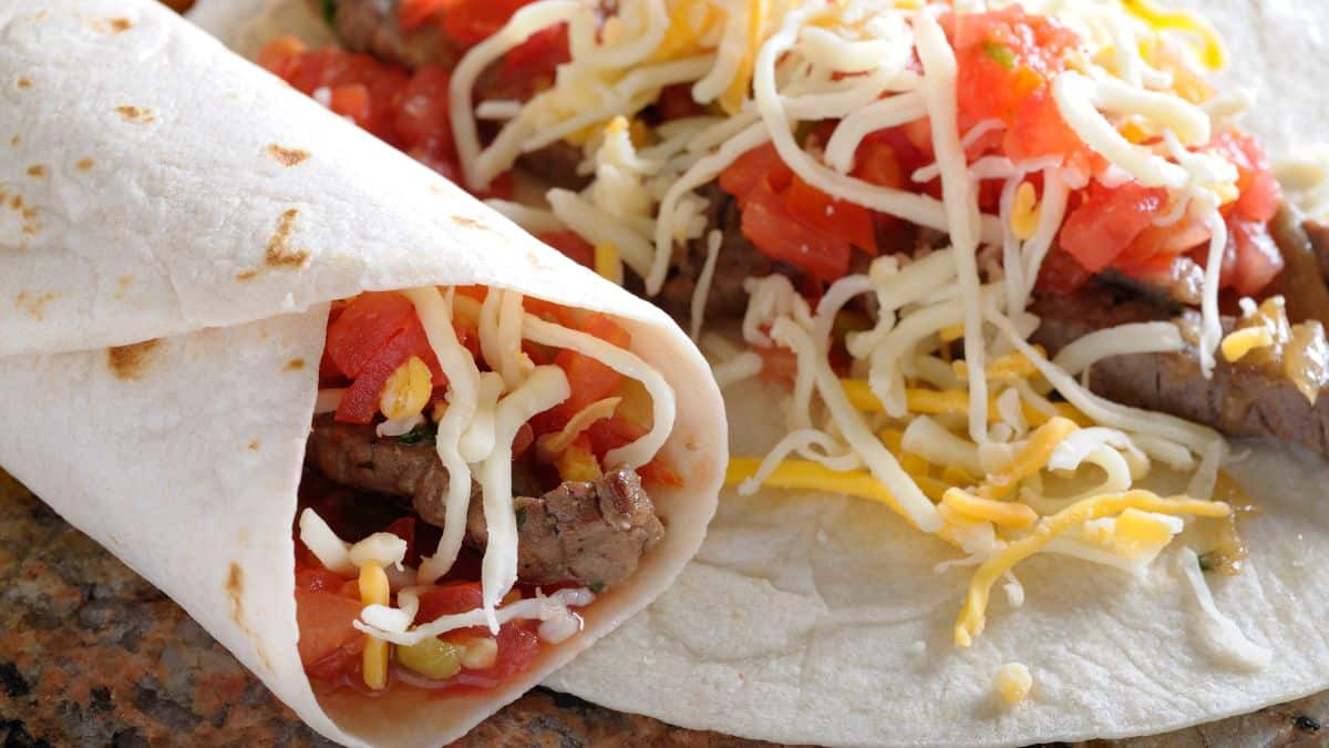 Burritos stuffed with extra cheese.