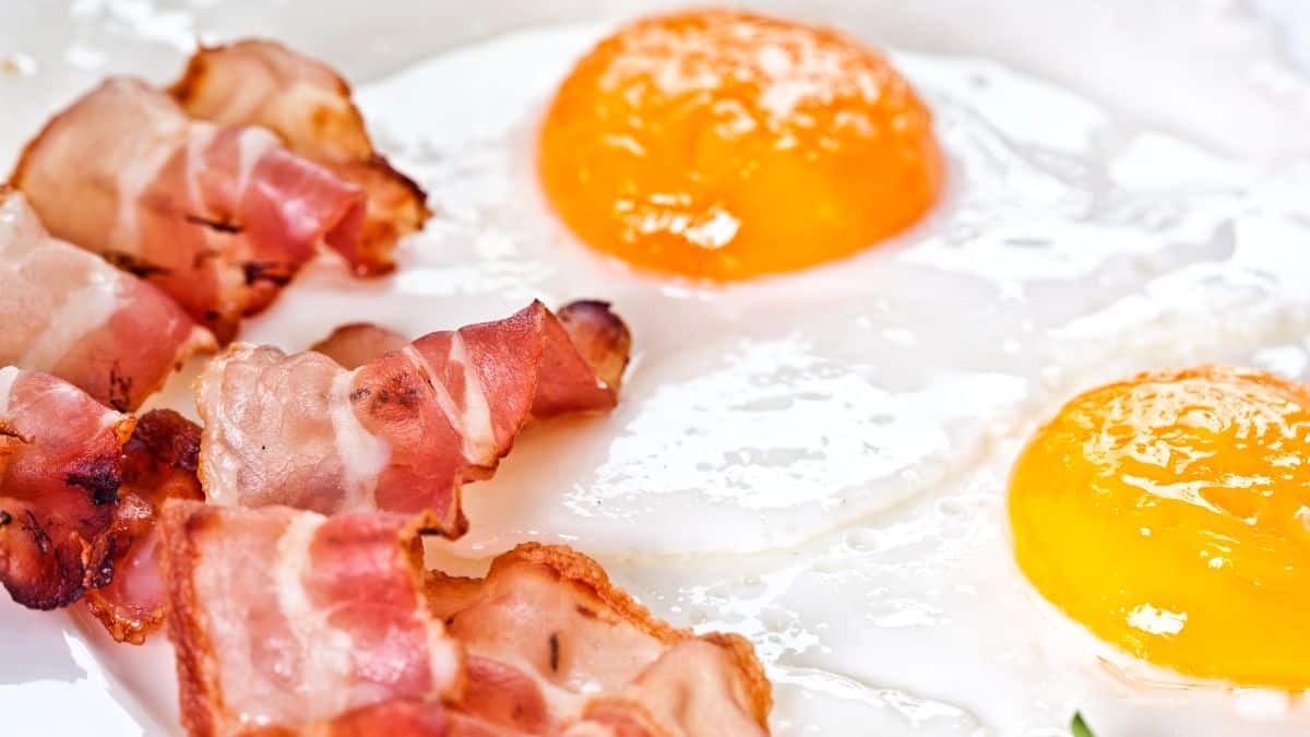 Close up of bacon and eggs.