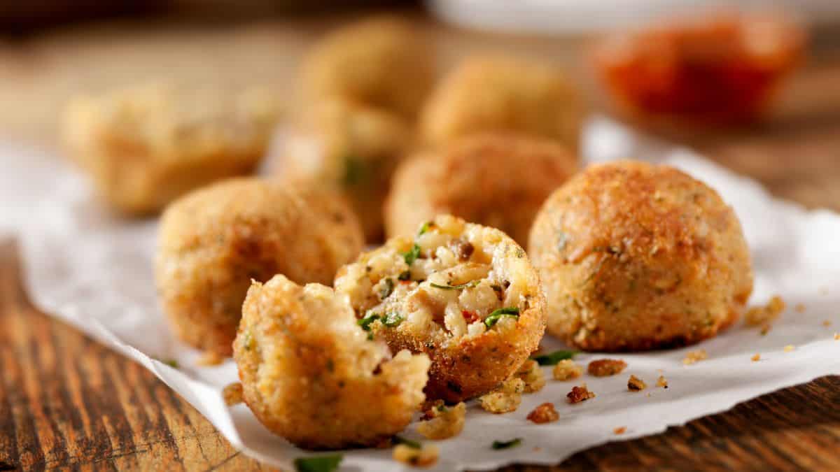 Stuffed rice balls on a paper.