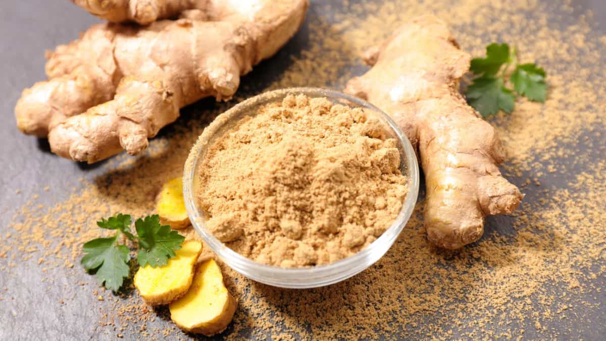 Ginger powder in a white bowl.