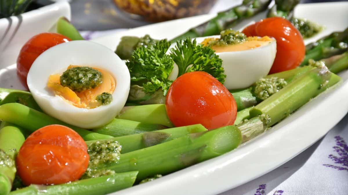 Pesto drizzled on vegetables.