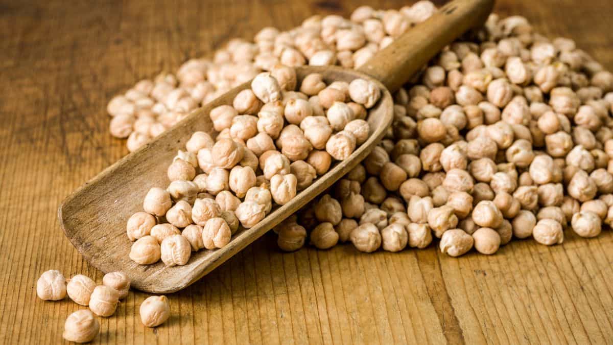 Chickpeas on a wooden board.