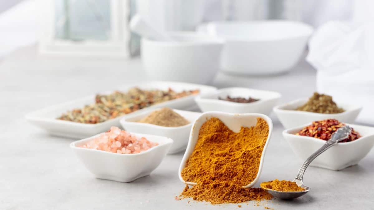 Curry spices on a kitchen counter.