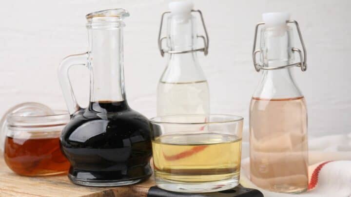 Different types of vinegar on a table.