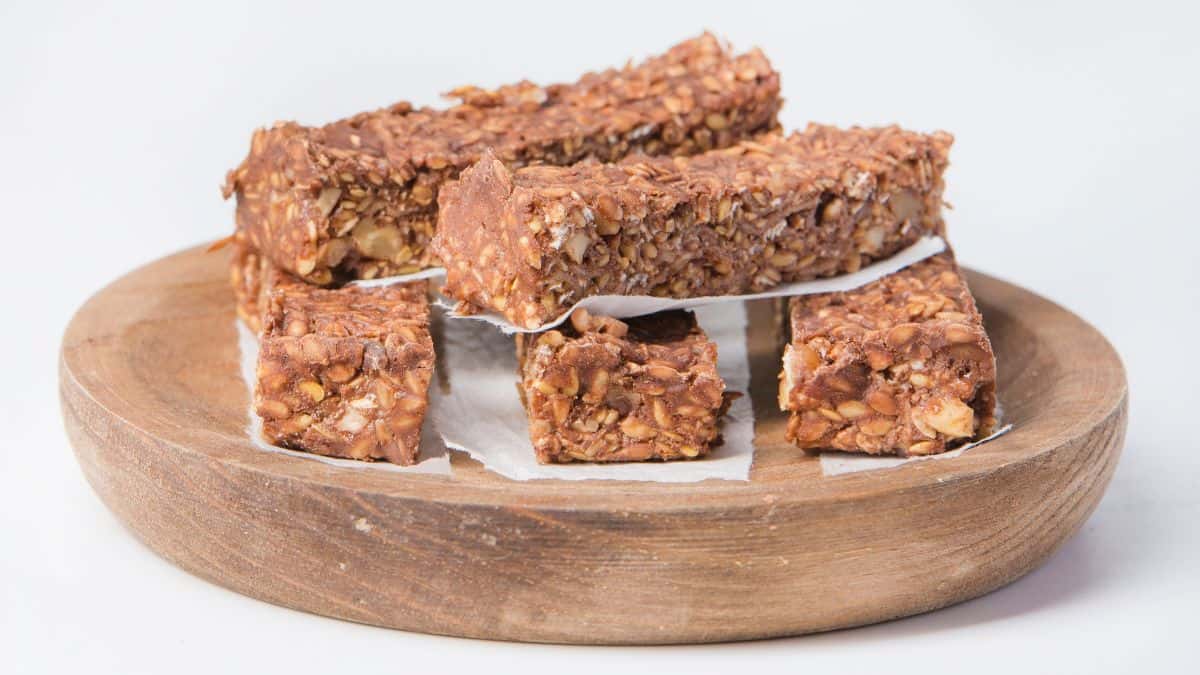 Energy bars on a wooden board.