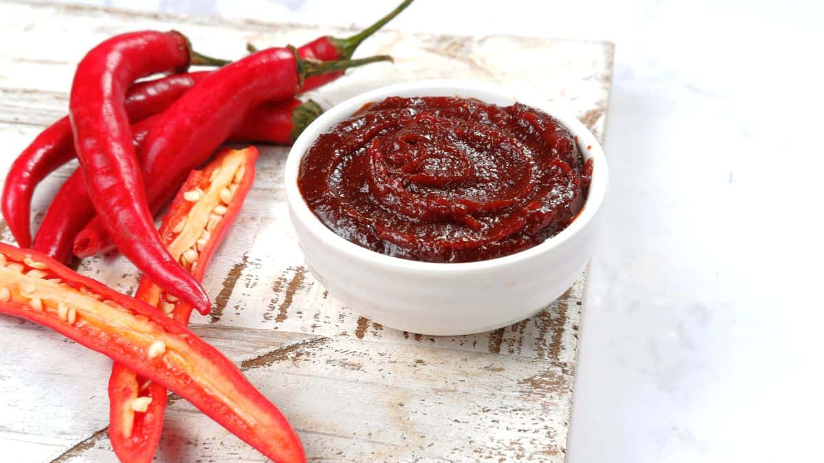 Gochujang paste in a white bowl.