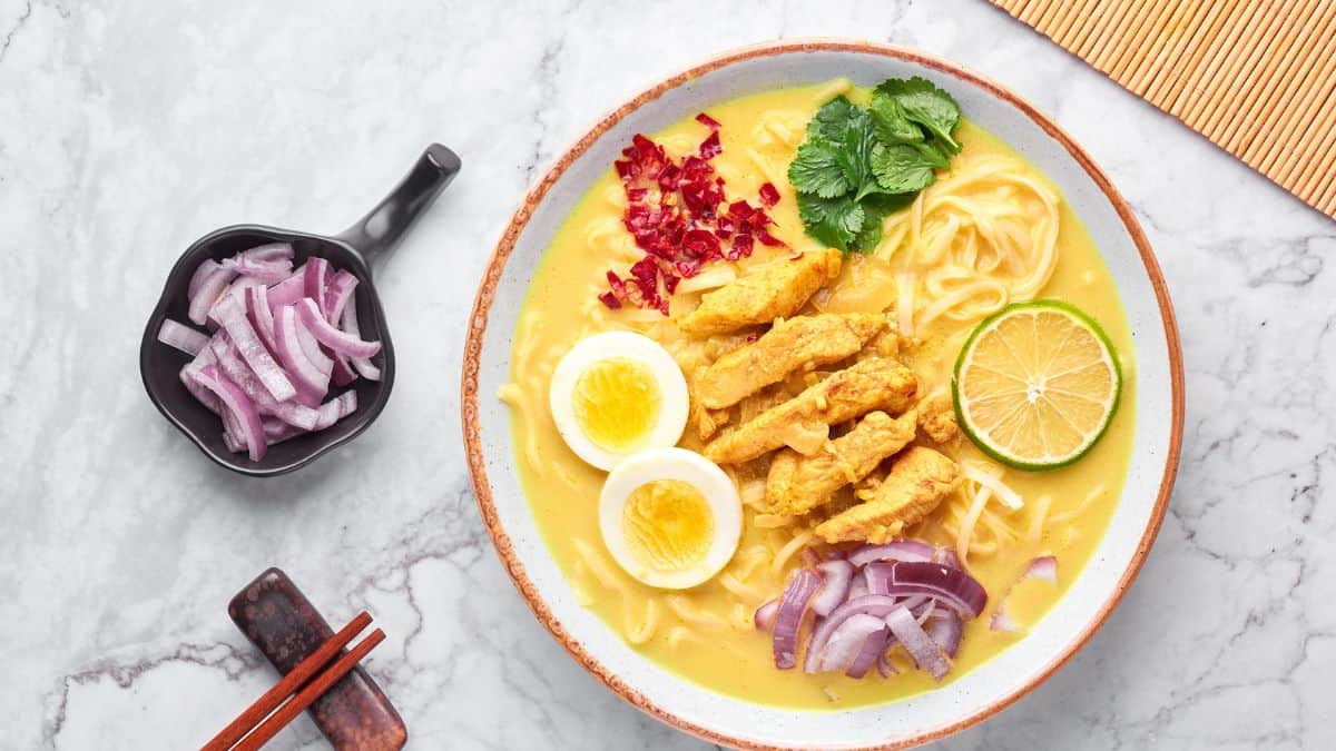 Burmese chicken curry topped with boiled egg.