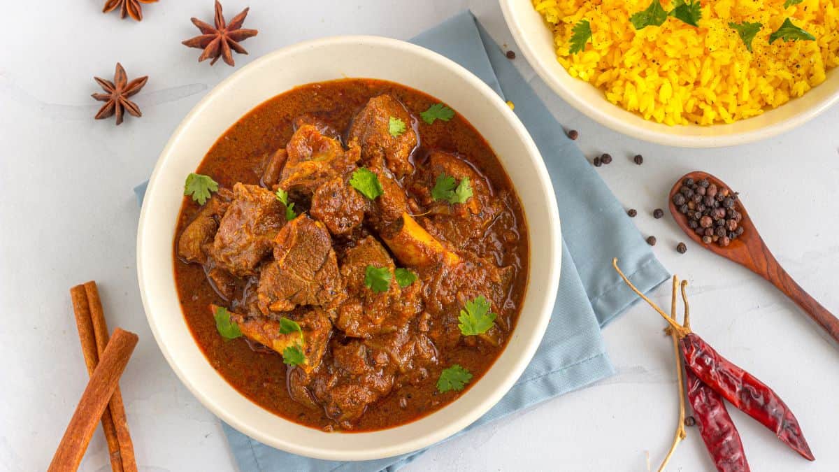 Mutton vindaloo served with saffron rice.