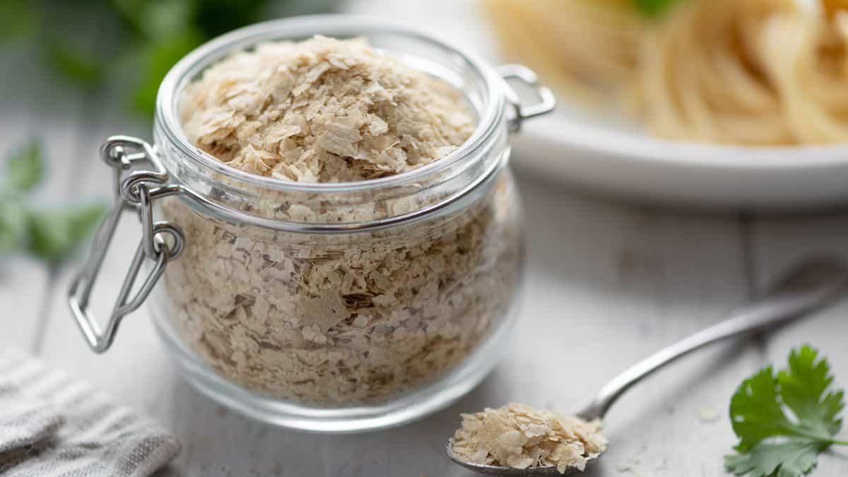 Yeast flakes stored in a glass jar.