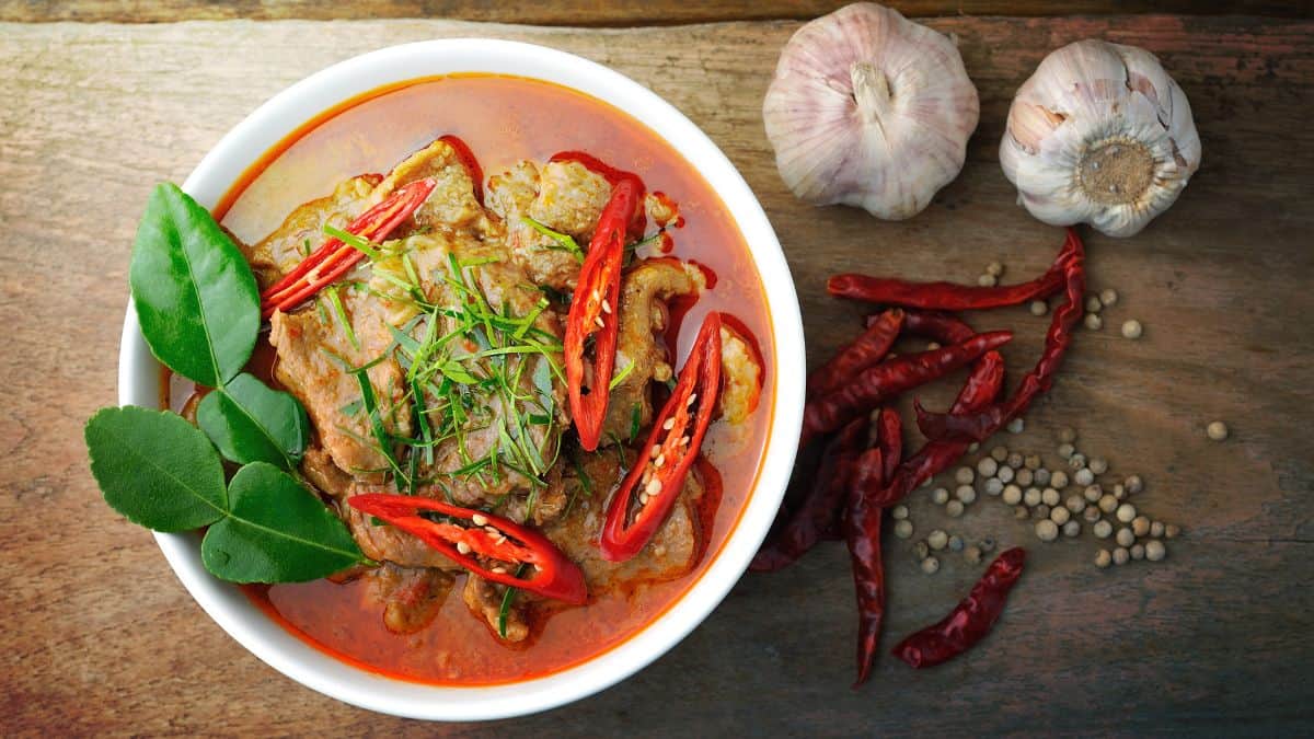 Panang curry in a white bowl.