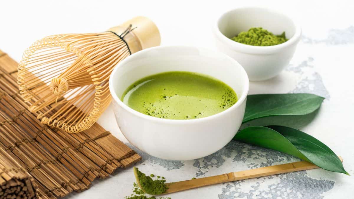 Matcha tea in two white cups.