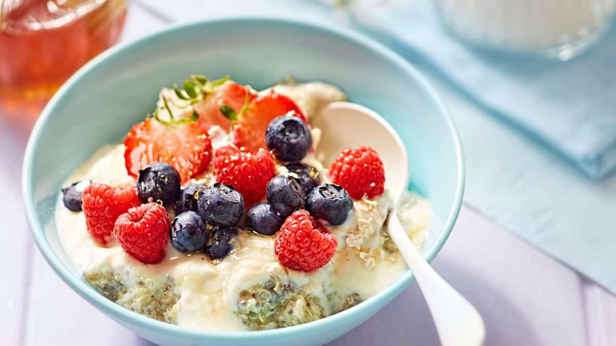 Quinoa porridge topped with berries.