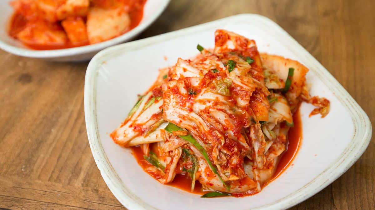 Kimchi on a white plate.