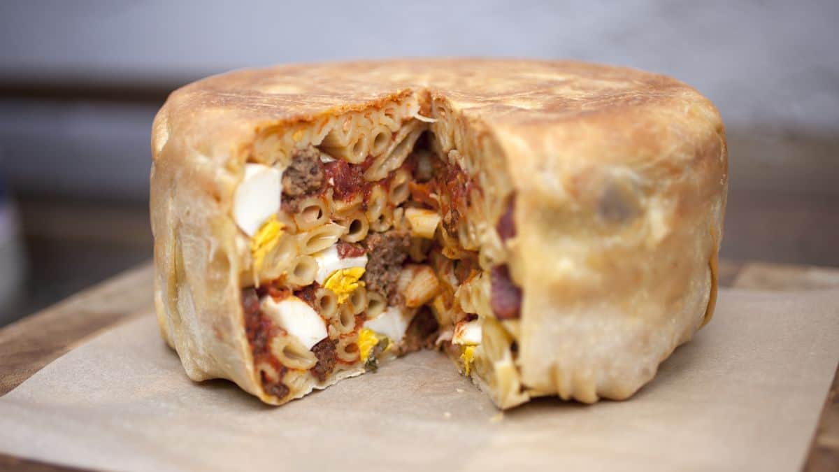 A large timpano on a wooden board.