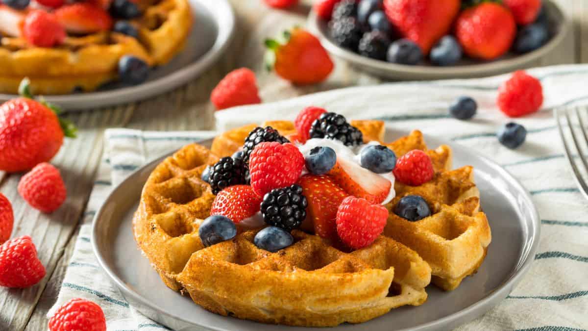 Waffles topped with berries.