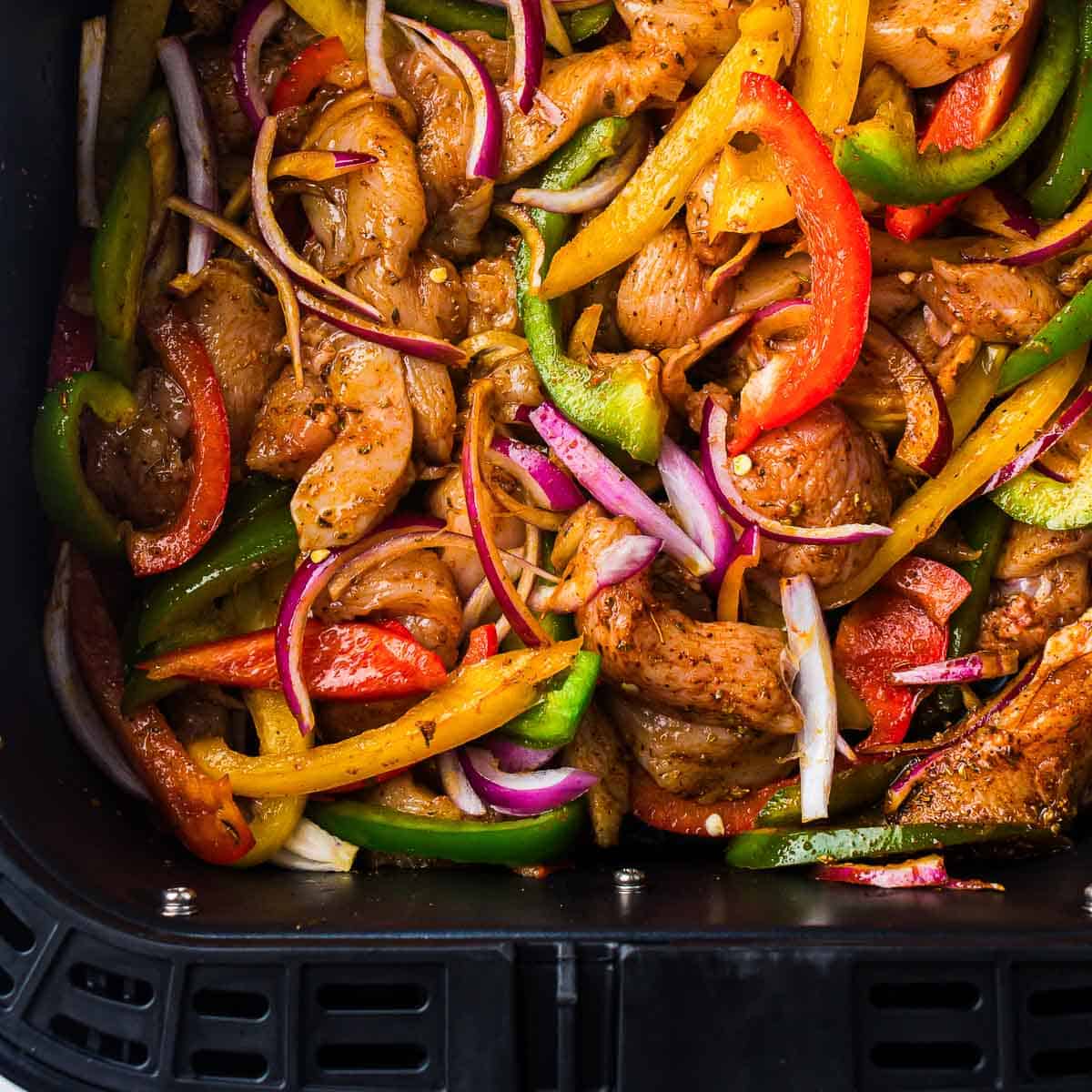 Seasoned ingredients placed in the preheated basket.