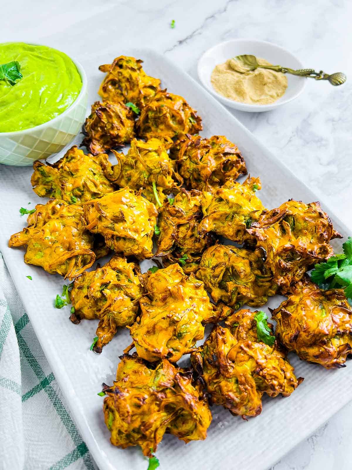 Brussels sprouts pakora served with mint chutney.