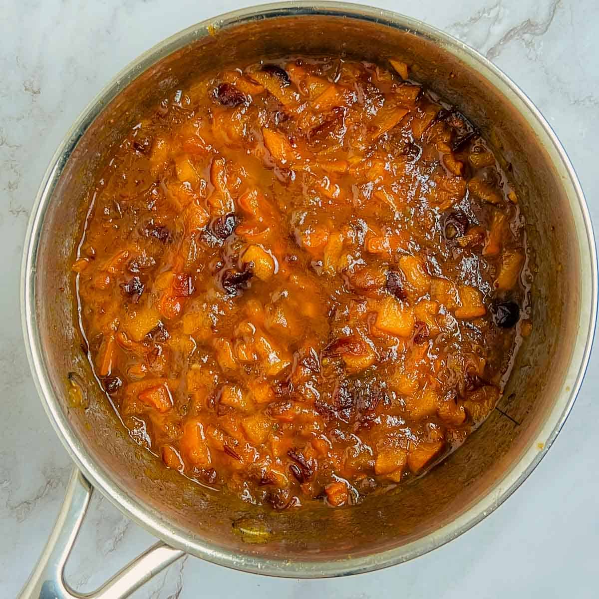 Cooked chutney in a saucepan.