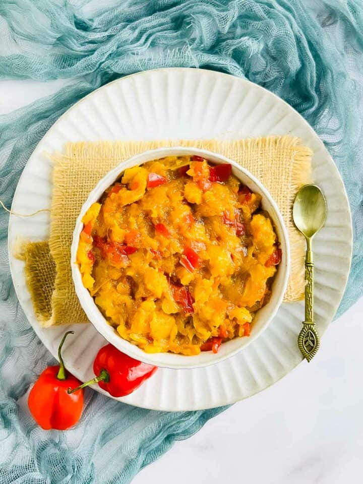 Pineapple habanero chutney in a white bowl.