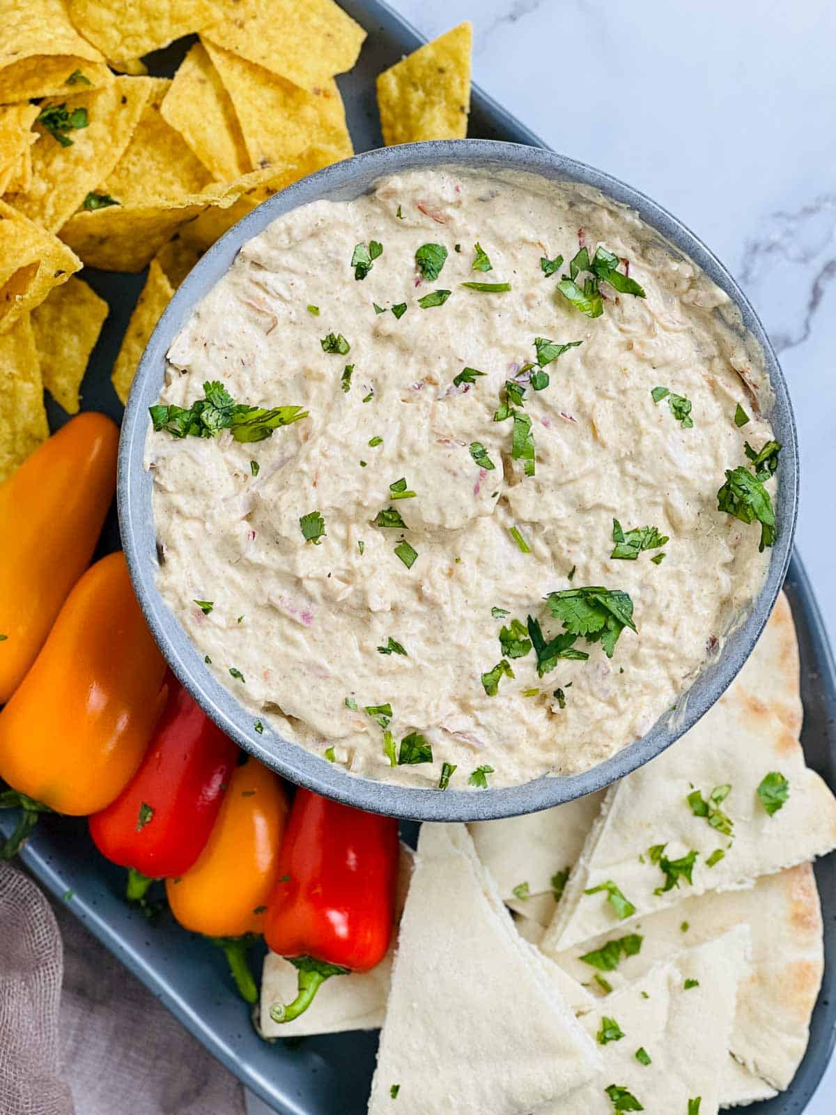 Tandoori chicken dip with a platter of dippers.