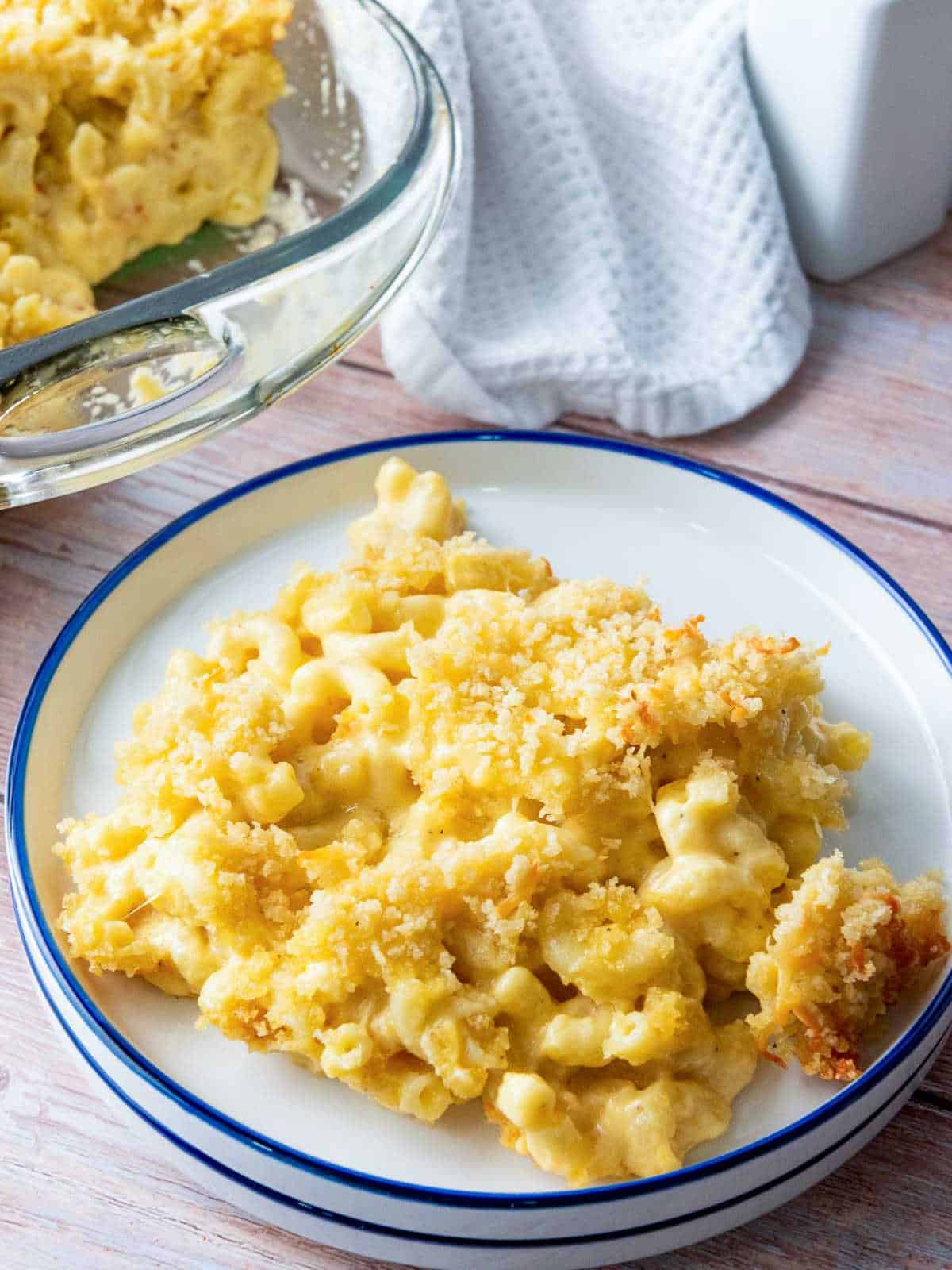 Baked mac and cheese on a white plate.