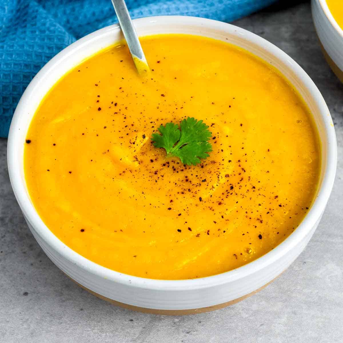 Close up of a bowl of butternut squash soup.