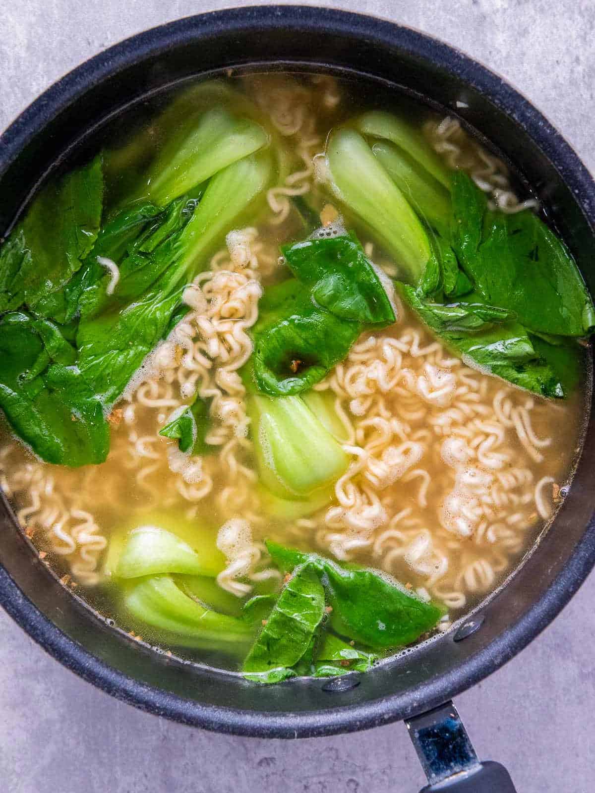 Bok choy cooked in the broth.