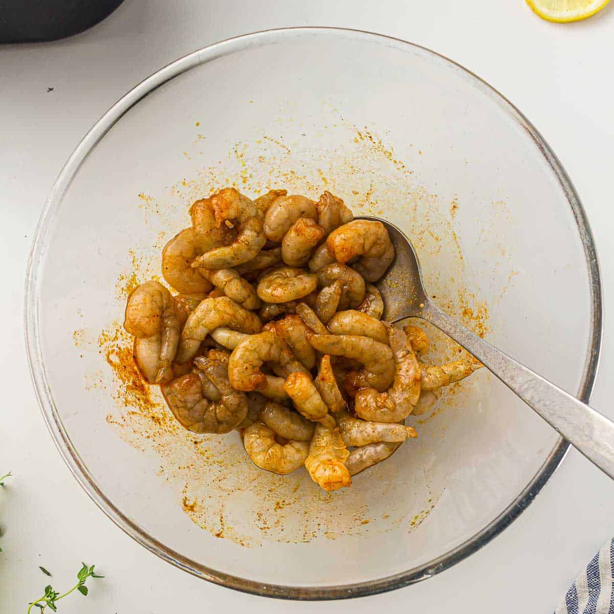 Marinated shrimp in a bowl.