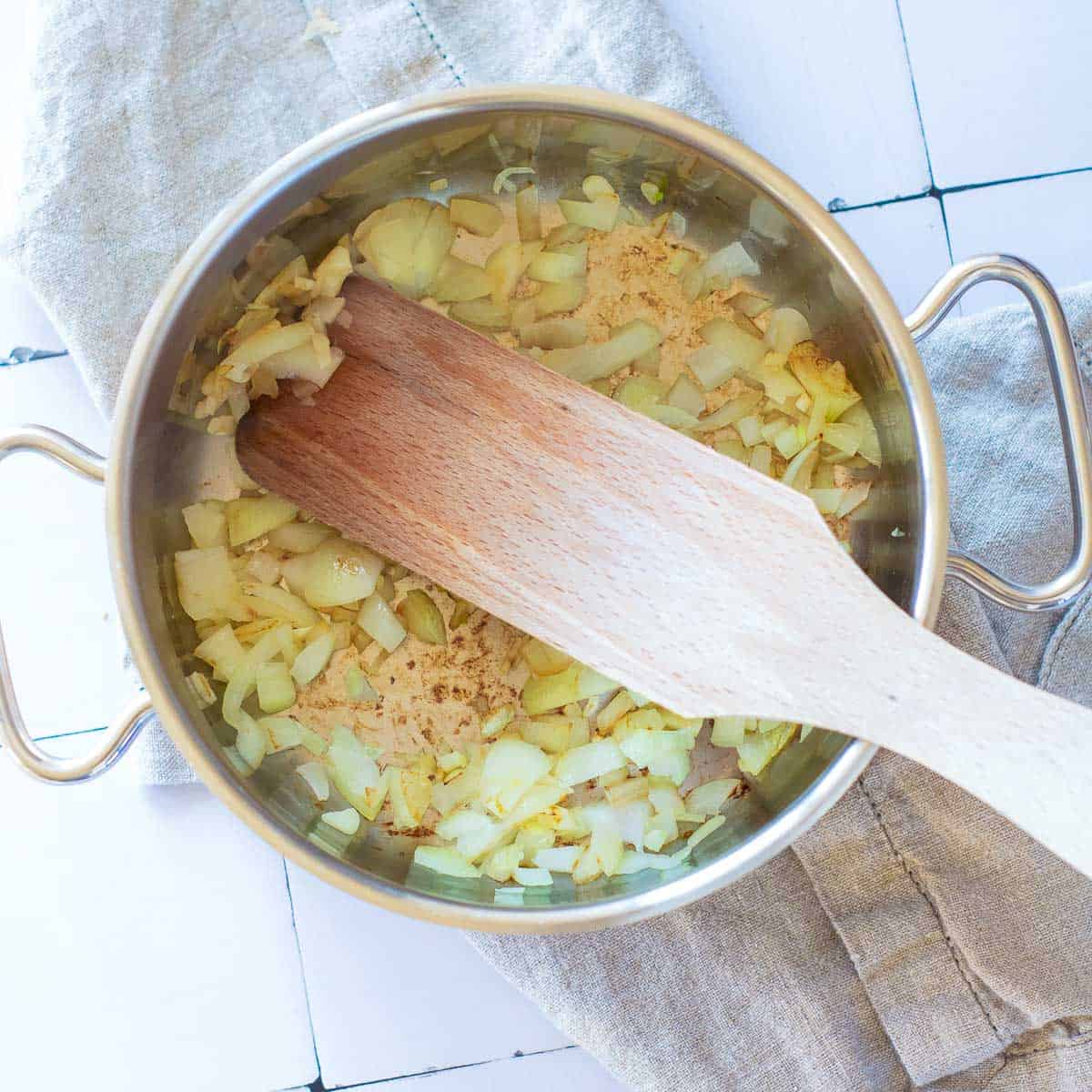 Sauted onion and garlic in the pot.