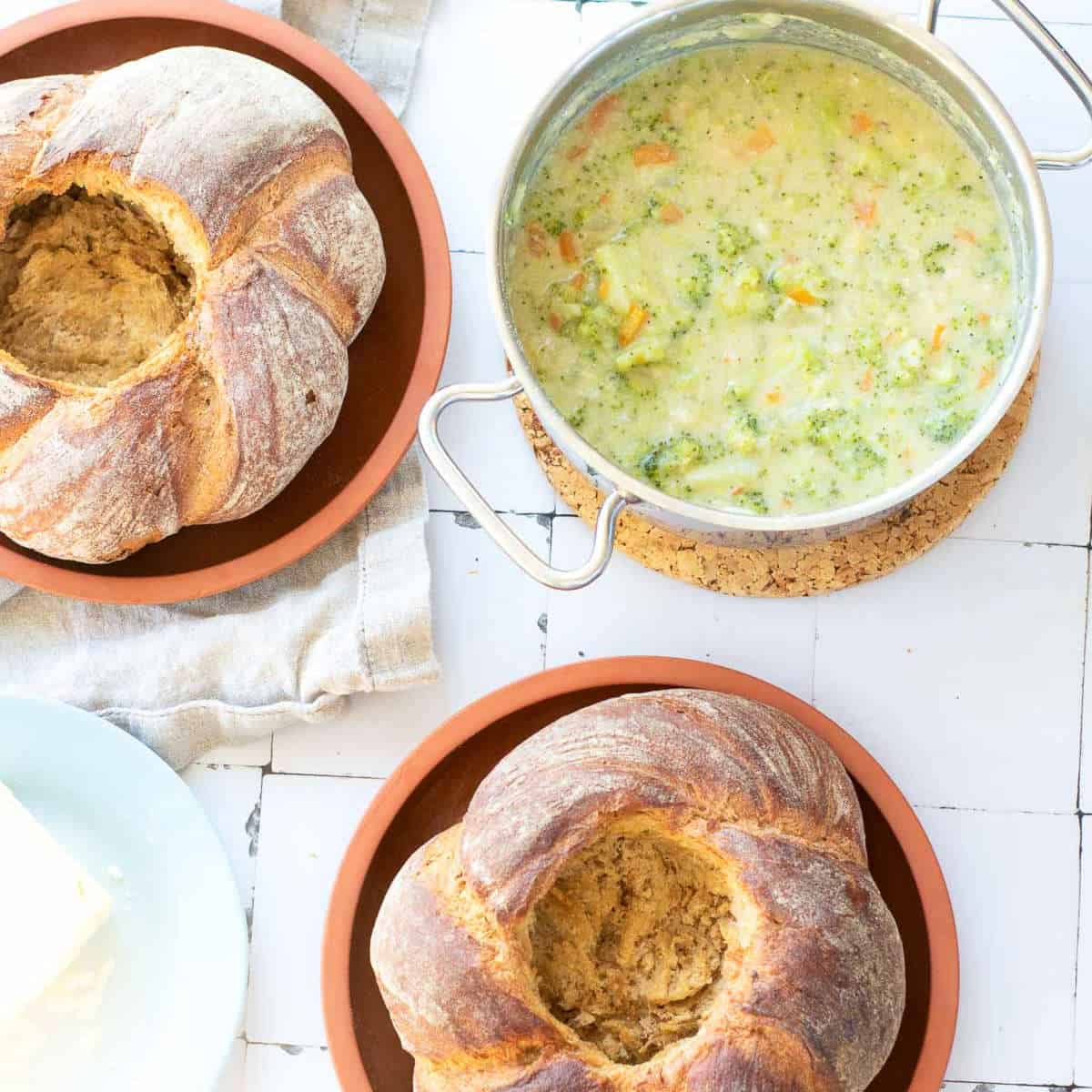 Soup ready to be served in the bread bowls.