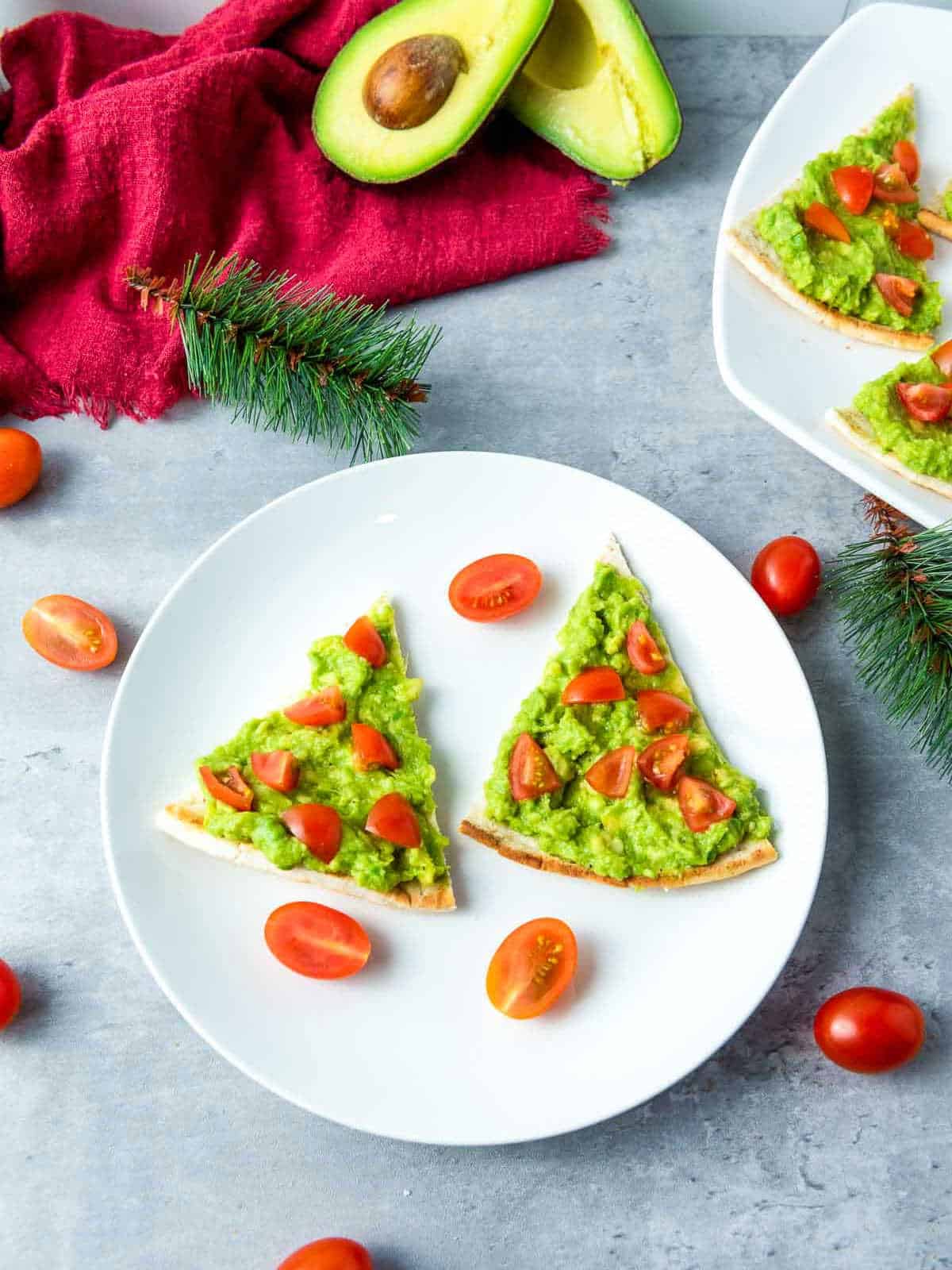 Christmas pita tree with avocado in the background.