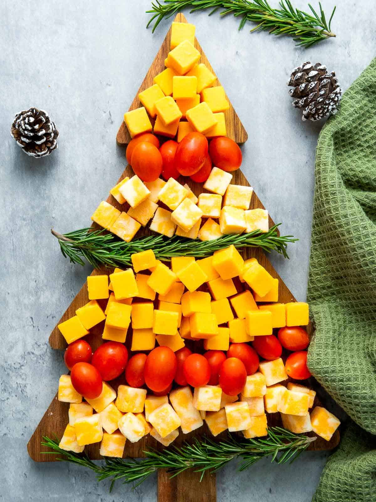 Cheese platter on a grey board.