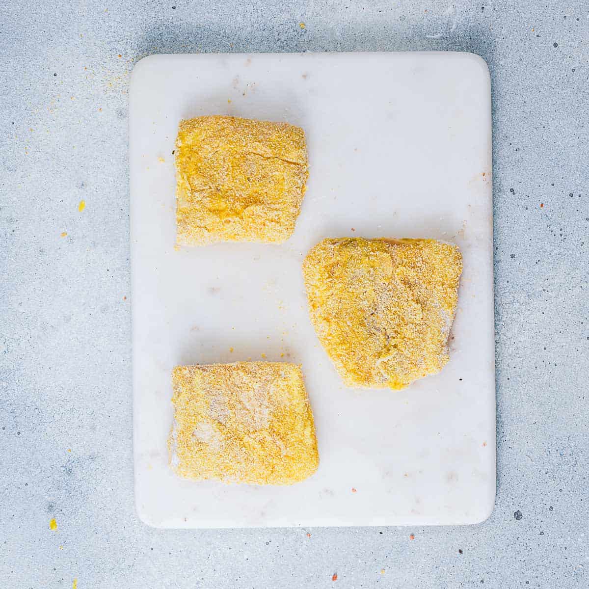 Breaded fish ready to be fried.