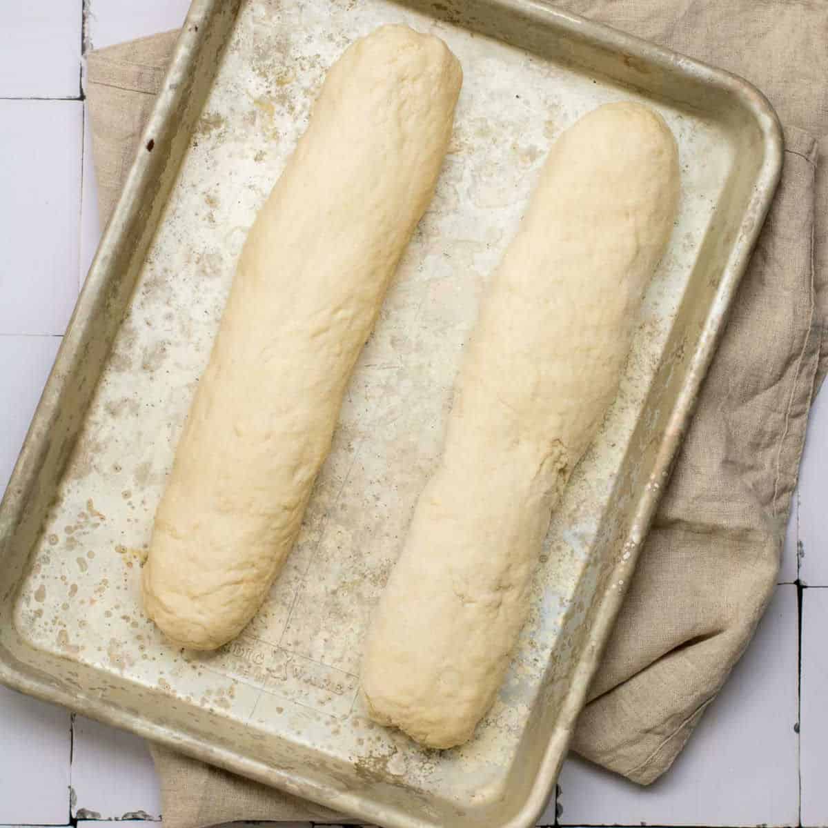 Dough placed on baking sheet for second proofing.