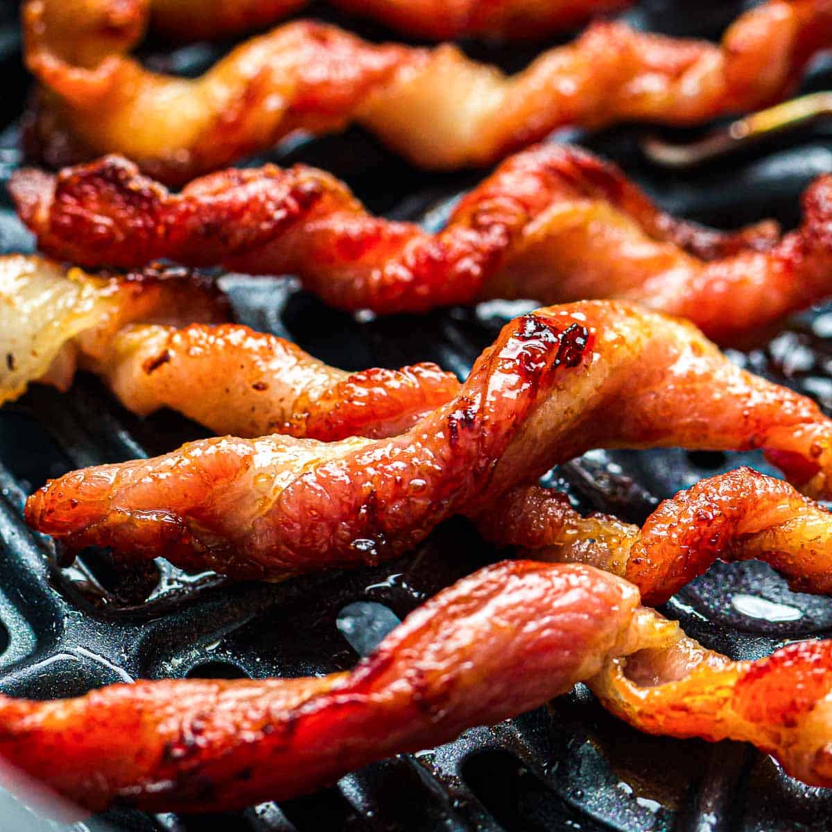 Close up of air fryer twisted bacon.