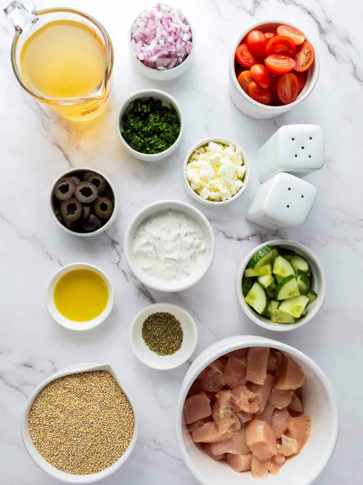 Ingredients placed on a white surface.