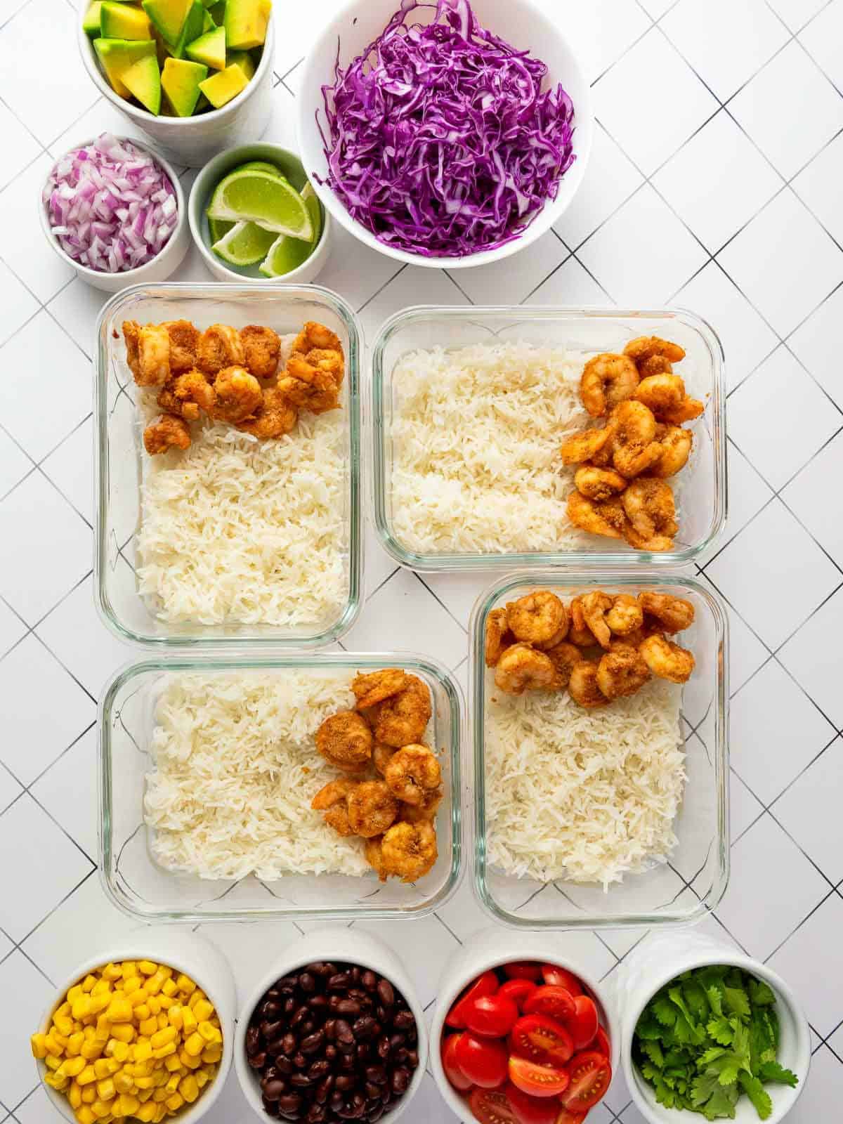 Rice and shrimp in meal prep containers.