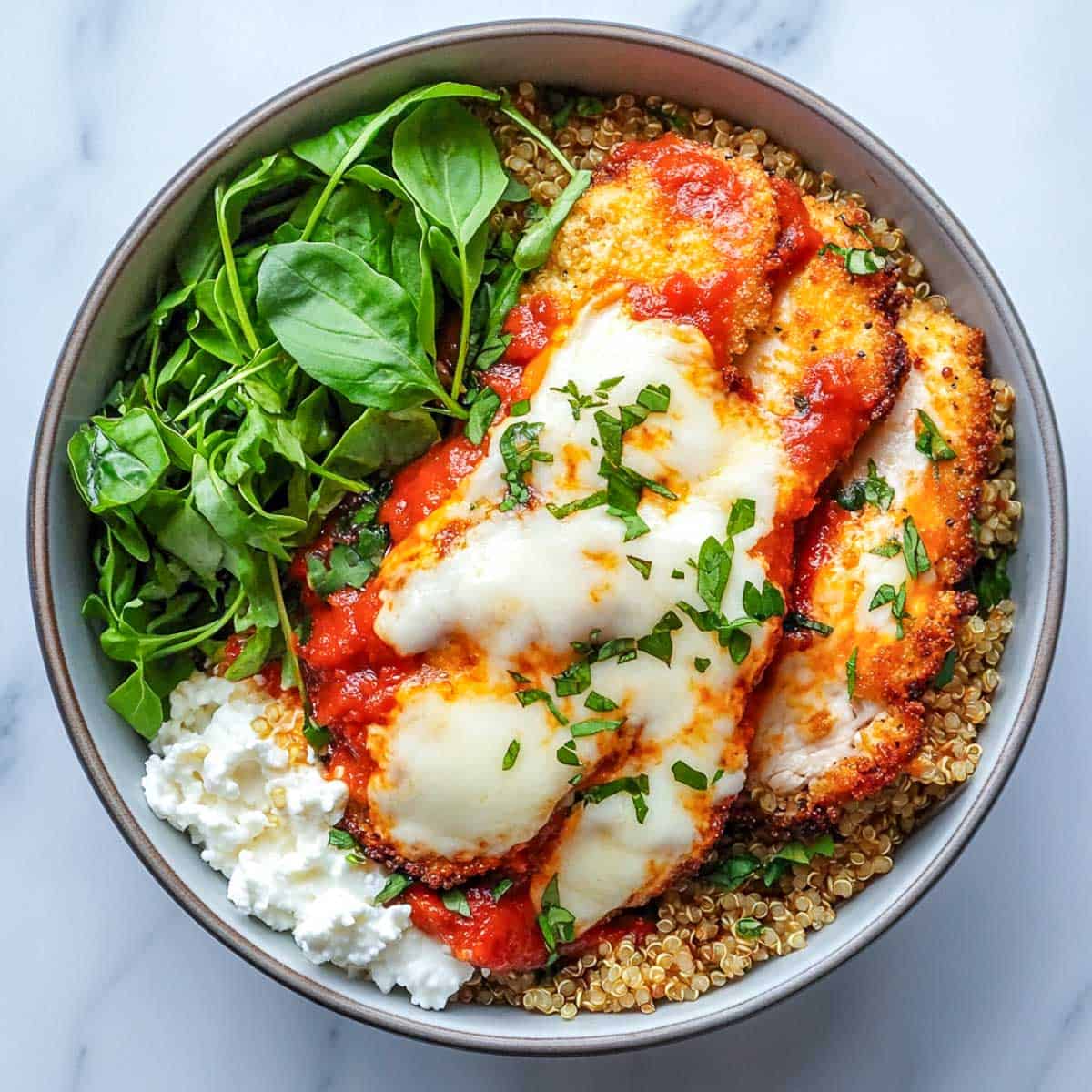 Chicken parma quinoa bowl.