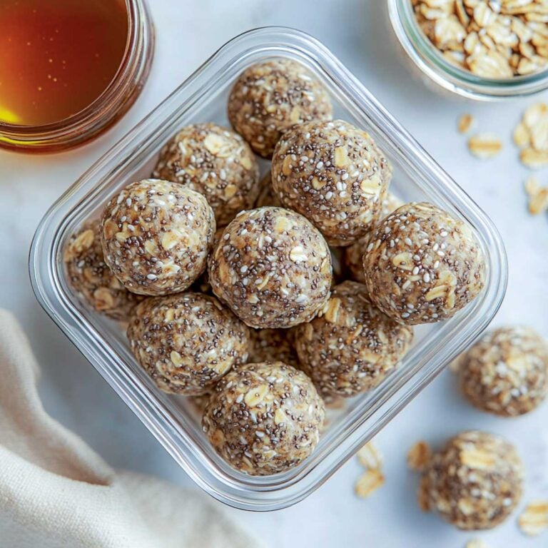 Chia flaxseeds energy balls on a marble surface.