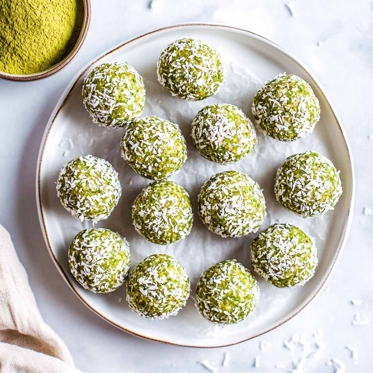 Matcha balls rolled in shredded coconut.