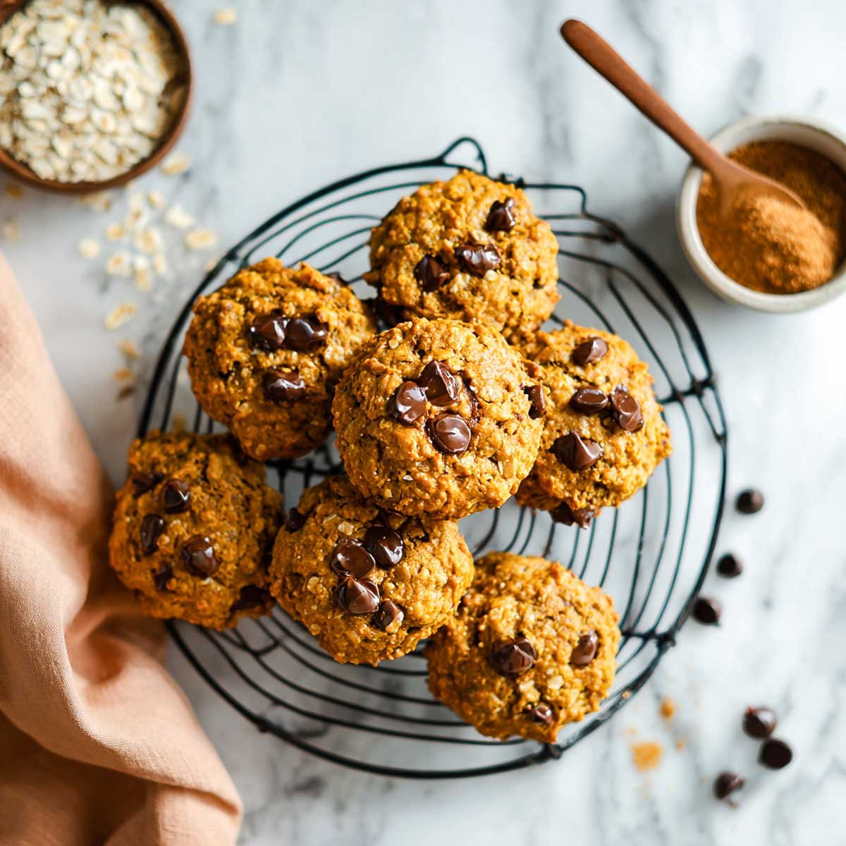 Brown butter pumpkin oatmeal cookies with gooey chocolate chips and chewy texture.